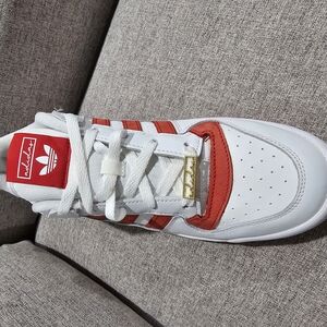 red and white adidas sneakers, lightly used
